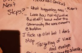 Written notes on a table at The Long Table event.