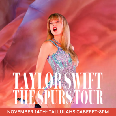 A photo of Taylor Swift- a white, blonde woman wearing a bedazzled iridescent bodysuit and red lipstick. She stands confidently on what appears to be a stage with a dreamy red fabric backdrop behind her. The words "Taylor Swift- The Spurs Tour" are written in white font in front of her.